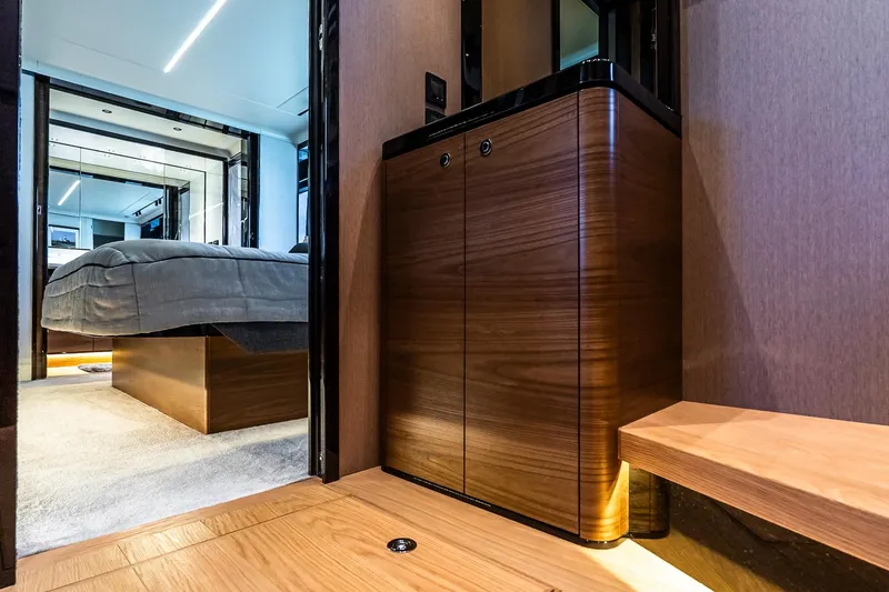 Slide: The Image of Luxurious interior of 2022 Absolute 64 Navetta yacht with modern wood finishes. - 99
