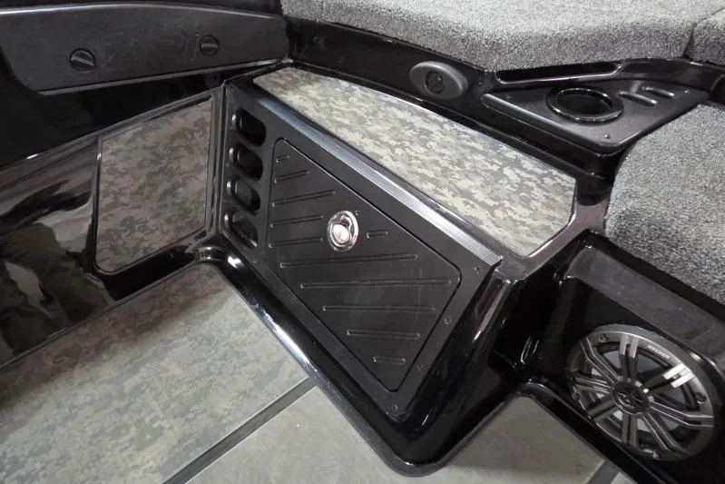 Slide: The Image of 2026 Nitro Z21 XL Pro boat interior with storage compartment and speaker. - 18