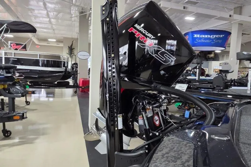 Slide: The Image of 2026 Nitro Z21 XL Pro boat with Mercury Pro XS engine in showroom. - 4