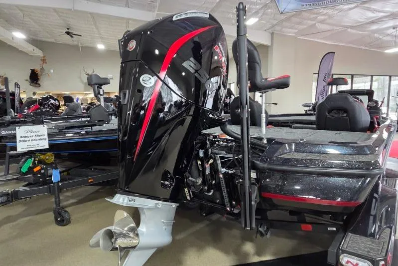 Slide: The Image of 2026 Nitro Z21 XL Pro boat with powerful outboard motor in showroom display. - 5