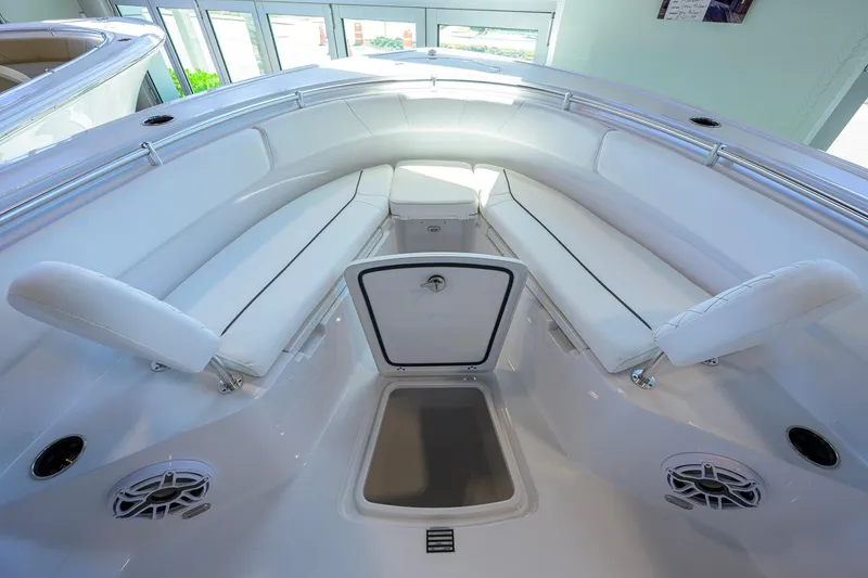 Slide: The Image of 2026 Sportsman Open 252 Center Console boat interior with seating and storage. - 13