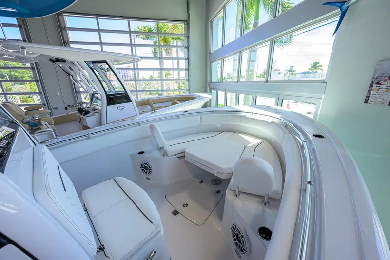 Slide: The Image of 2026 Sportsman Open 252 Center Console boat interior with seating and modern design. - 20
