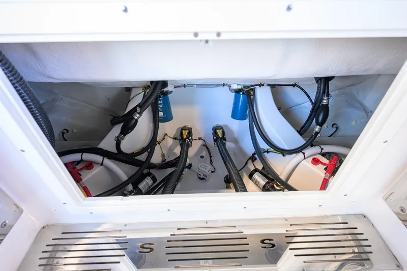 Slide: The Image of 2026 Sportsman Open 252 Center Console boat wiring and plumbing system. - 36