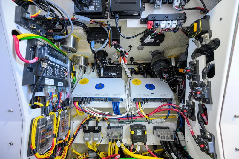 Slide: The Image of Electrical system of 2026 Sportsman Open 252 Center Console boat, showcasing wiring and components. - 46