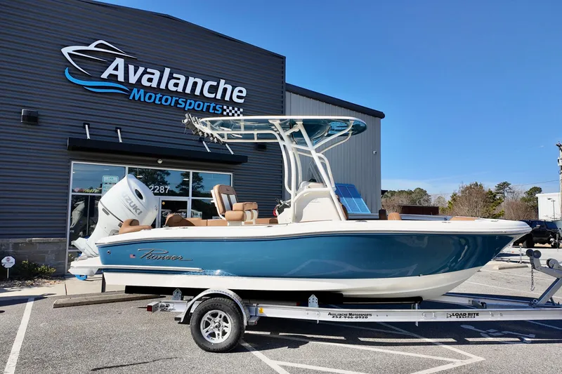 The Image of 2026 Pioneer 202 Islander boat on trailer at Avalanche Motorsports dealership. - 2