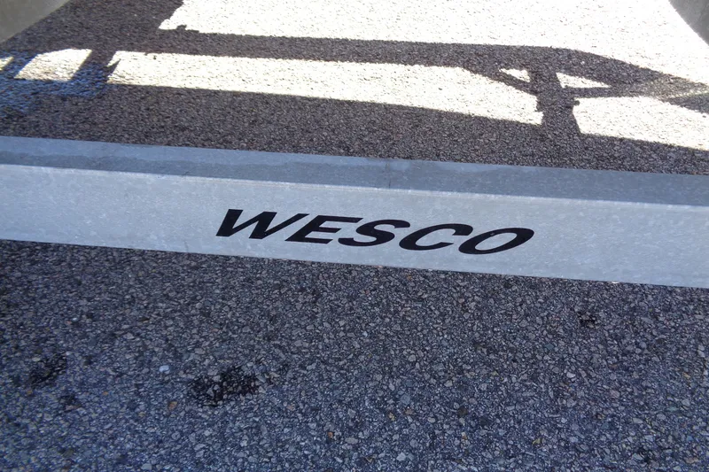 Slide: The Image of Trailer with "WESCO" branding for 1987 Boston Whaler Montauk 17' CC boat. - 16