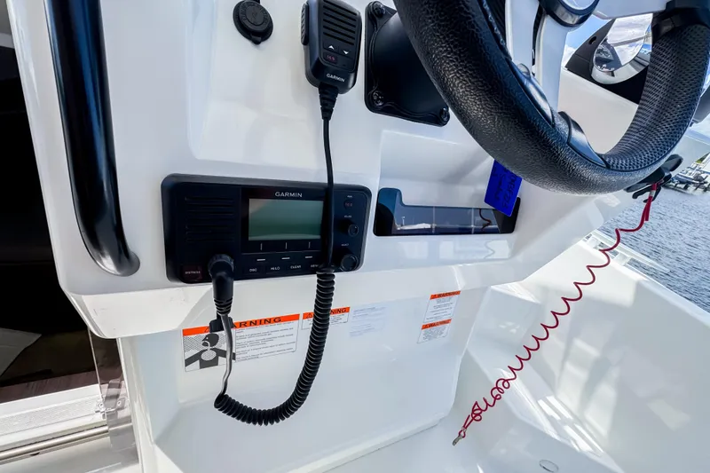 Slide: The Image of Beneteau Flyer 9 SUNdeck 2023 helm with Garmin device. - 18