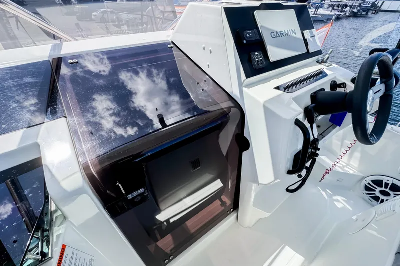 Slide: The Image of 2023 Beneteau Flyer 9 SUNdeck cockpit with Garmin navigation. - 19