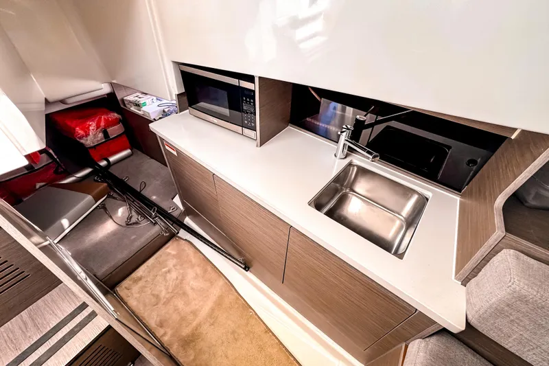 Slide: The Image of Interior of 2023 Beneteau Flyer 9 SUNdeck with kitchenette and sink. - 22