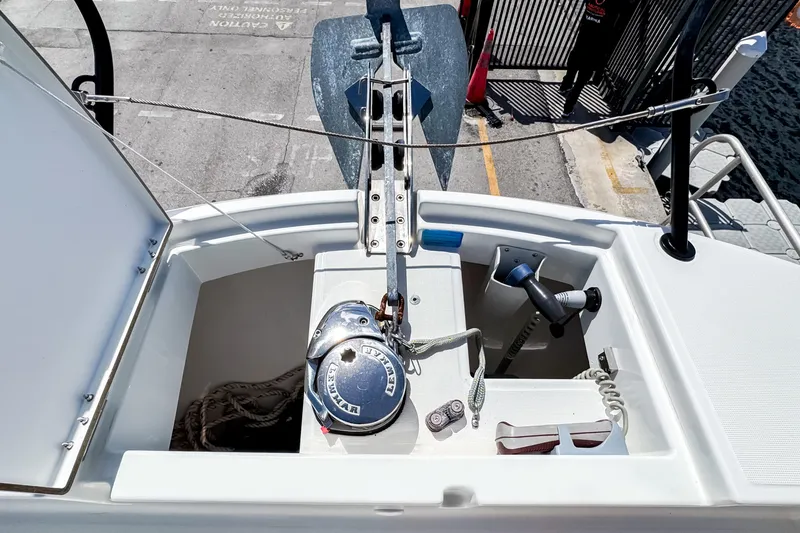 Slide: The Image of Beneteau Flyer 9 SUNdeck 2023 anchor area with winch and ropes. - 25