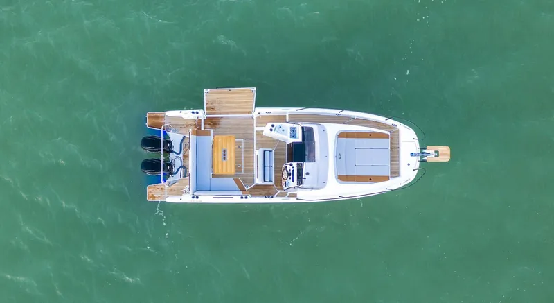 Slide: The Image of Aerial view of 2023 Beneteau Flyer 9 SUNdeck on water. - 3