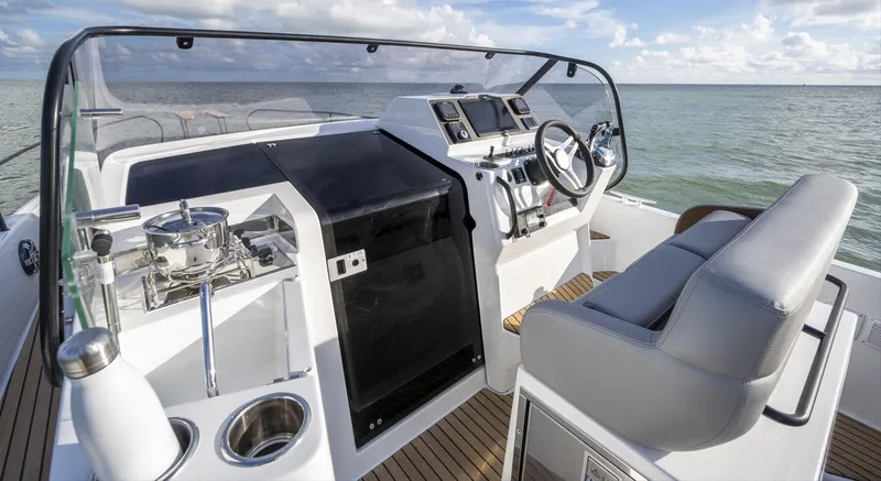 Slide: The Image of Cockpit of 2023 Beneteau Flyer 9 SUNdeck on open sea. - 5