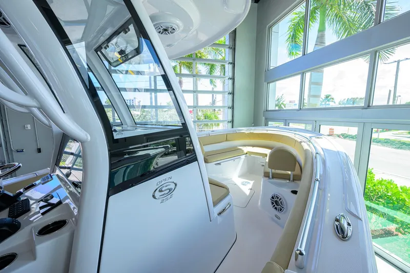Slide: The Image of 2026 Sportsman Open 232 Center Console boat interior with seating and modern design. - 19