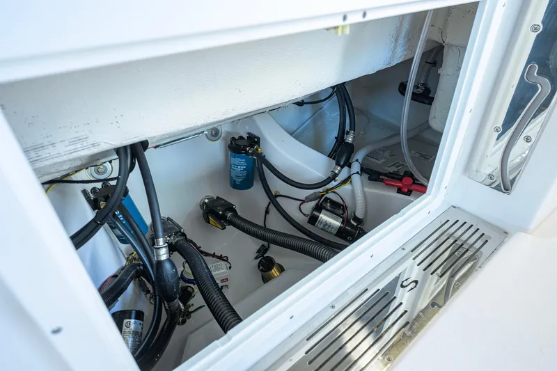Slide: The Image of 2026 Sportsman Open 232 Center Console boat interior wiring and components. - 36