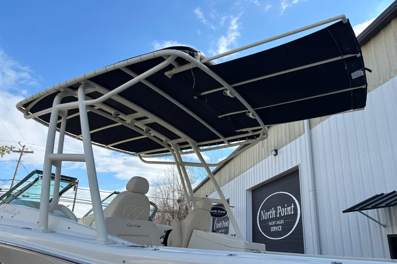 Slide: The Image of 2017 Chris-Craft Calypso 26 boat with T-top, parked near North Point Yacht Sales. - 23