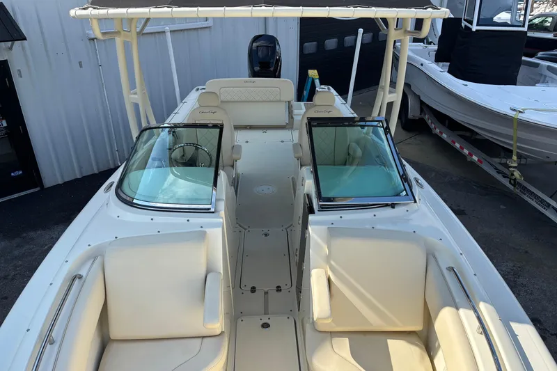 Slide: The Image of 2017 Chris-Craft Calypso 26 boat with spacious seating and dual windshields. - 36