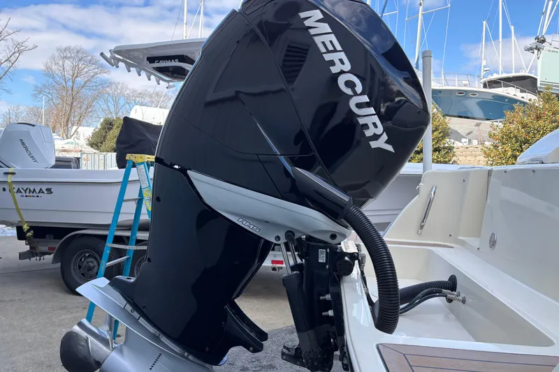 Slide: The Image of 2017 Chris-Craft Calypso 26 with Mercury outboard engine at marina. - 41