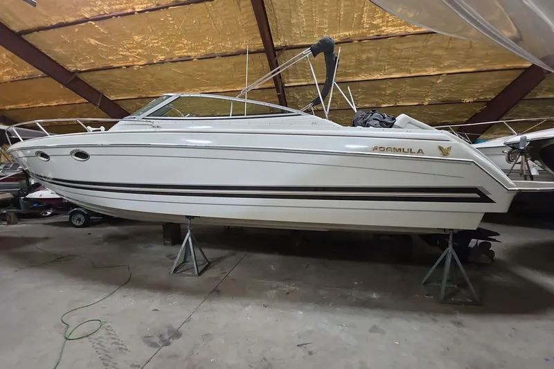 The Image of 2000 Formula 330 Sun Sport boat in storage, side view. - 1