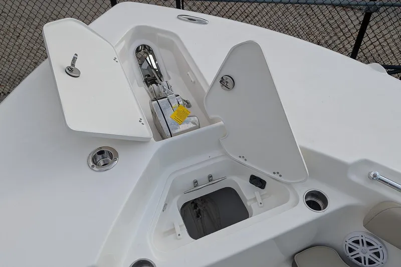 Slide: The Image of 2026 Key West 244 Center Console boat anchor storage and compartments. - 19