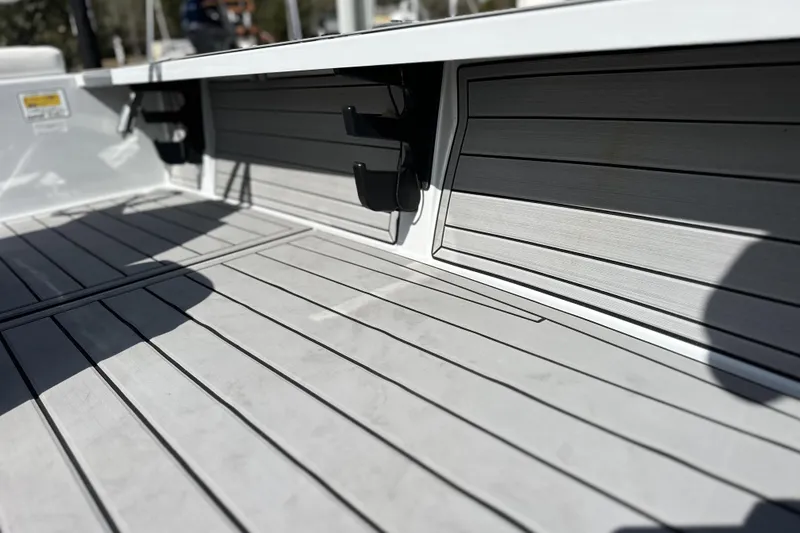 Slide: The Image of 2022 Hewes Redfisher 21 boat interior with sleek, modern deck design. - 10