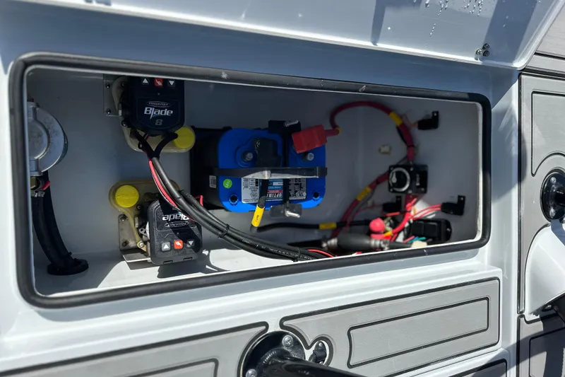 Slide: The Image of 2022 Hewes Redfisher 21 boat electrical panel with wiring and components. - 13