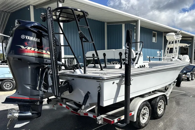 Slide: The Image of 2022 Hewes Redfisher 21 boat with Yamaha VMAX engine on a trailer. - 2