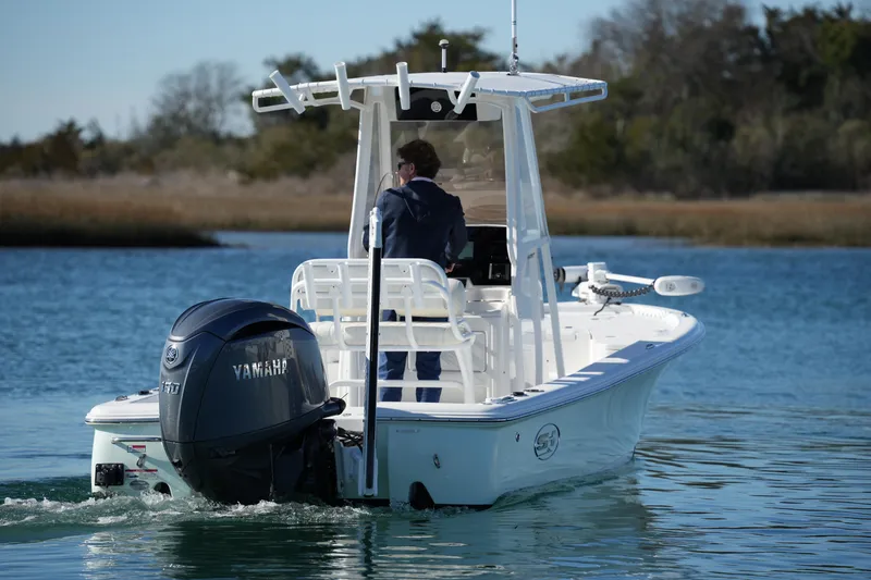Slide: The Image of 2020 Sea Hunt BX 20 BR boat with Yamaha engine on calm water. - 14