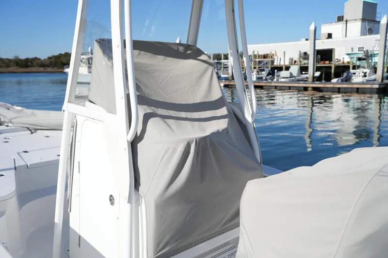 Slide: The Image of 2020 Sea Hunt BX 20 BR boat with protective cover at marina. - 17