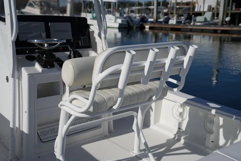 Slide: The Image of 2020 Sea Hunt BX 20 BR boat interior with rod holders and Garmin electronics. - 22