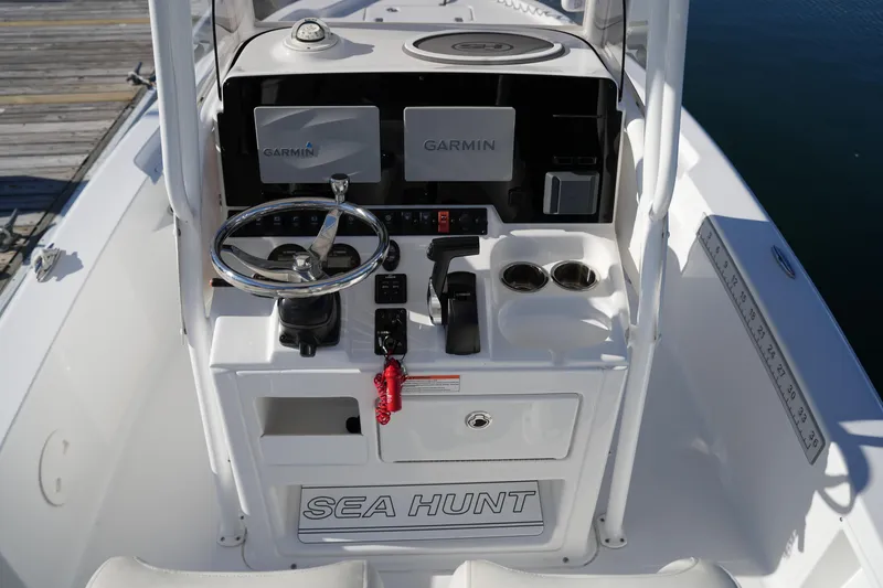 Slide: The Image of 2020 Sea Hunt BX 20 BR boat console with Garmin navigation and steering wheel. - 25