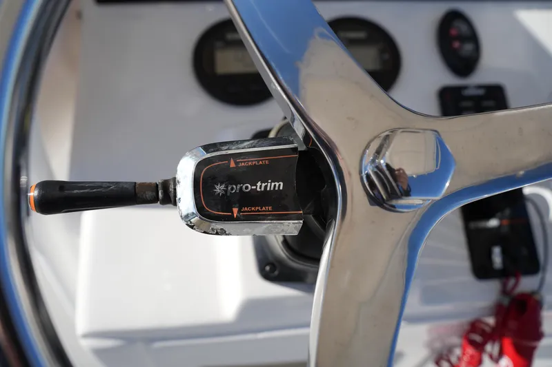 Slide: The Image of Steering wheel and controls of 2020 Sea Hunt BX 20 BR boat. - 27