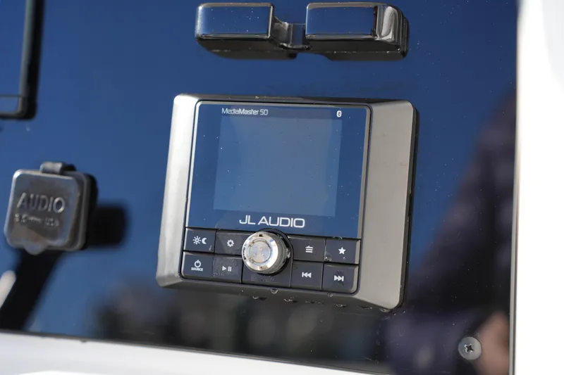 Slide: The Image of JL Audio MediaMaster 50 on 2020 Sea Hunt BX 20 BR boat dashboard. - 30