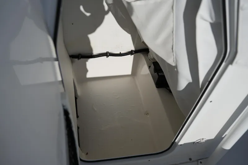 Slide: The Image of 2020 Sea Hunt BX 20 BR boat storage compartment interior view. - 36