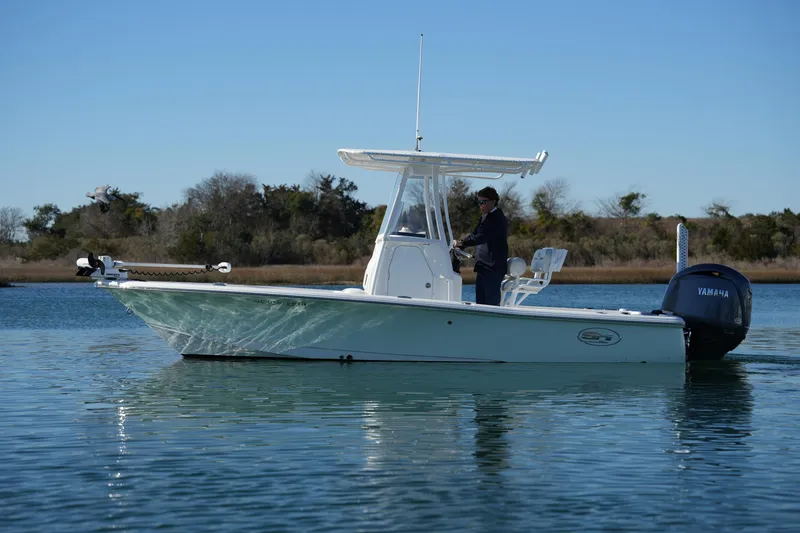 Slide: The Image of 2020 Sea Hunt BX 20 BR boat on calm water with Yamaha engine. - 5