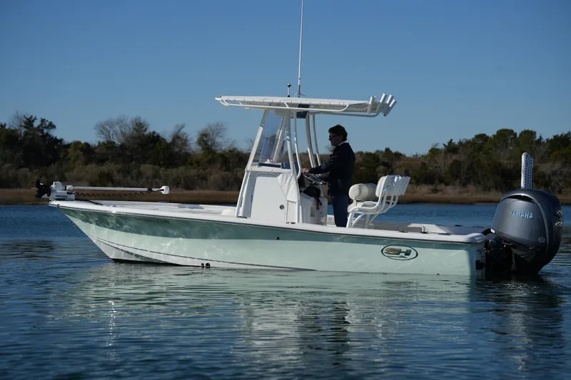 Slide: The Image of 2020 Sea Hunt BX 20 BR boat on calm water with Yamaha engine. - 7