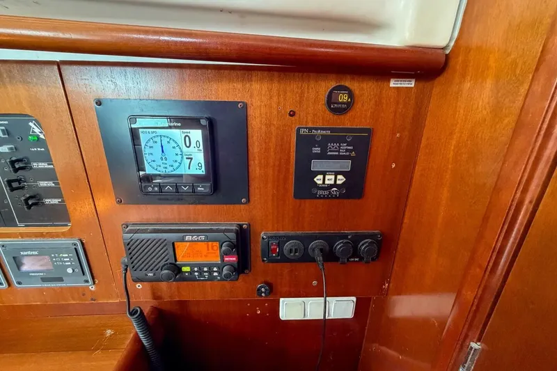 Slide: The Image of Control panel of a 1998 Beneteau Oceanis 36 CC sailboat with navigation instruments. - 26