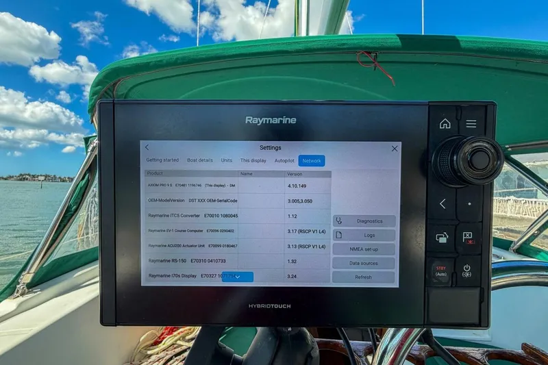 Slide: The Image of Raymarine navigation system on 1998 Beneteau Oceanis 36 CC sailboat, displaying network settings. - 54