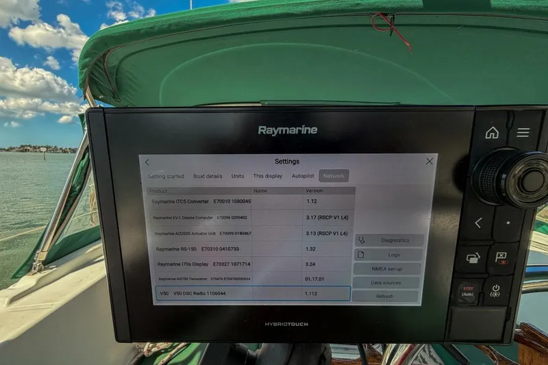 Slide: The Image of Raymarine display on 1998 Beneteau Oceanis 36 CC sailboat, showing network settings. - 55