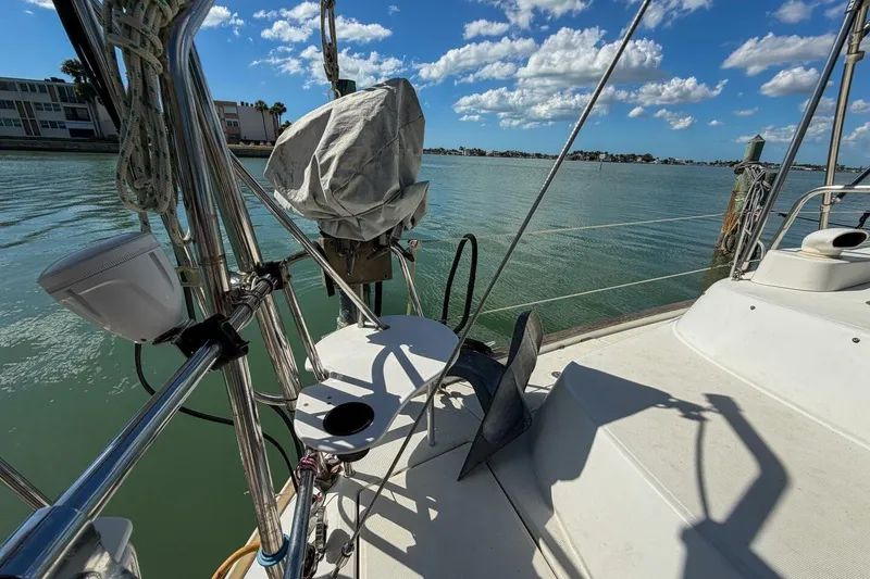 Slide: The Image of Sailboat deck view of 1998 Beneteau Oceanis 36 CC on calm water under blue sky. - 61