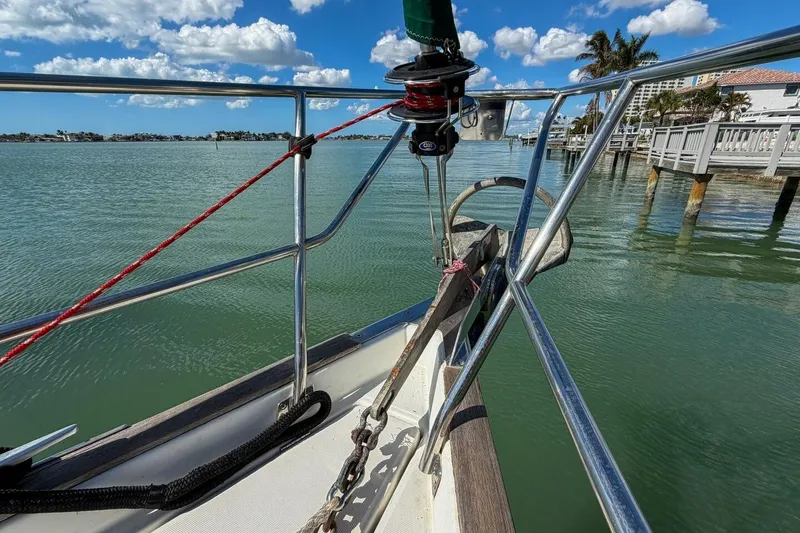 Slide: The Image of Bow view of 1998 Beneteau Oceanis 36 CC sailboat on calm waters. - 70