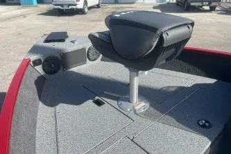 Slide: The Image of 2026 Lund 1650 Angler SS boat interior with seating and storage compartments. - 9