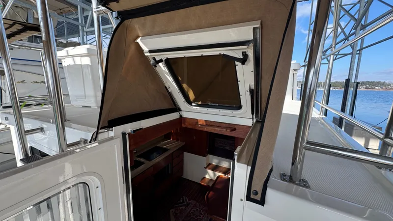 Slide: The Image of Salon Entry with Dutch Door Open & Bimini - 6
