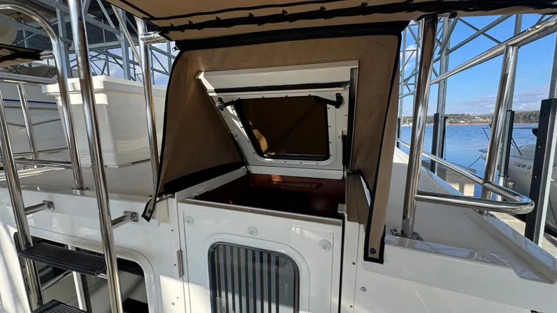 Slide: The Image of Salon Entry with Dutch Door Closed & Bimini - 7