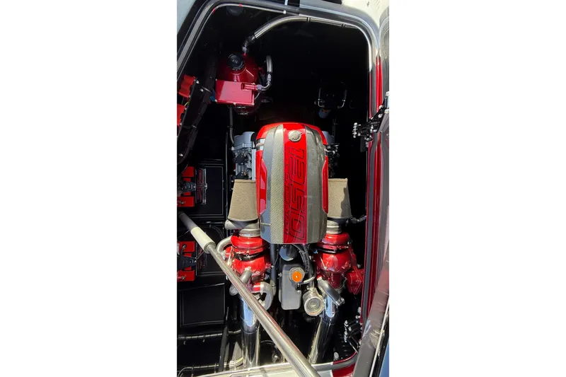 Slide: The Image of 2018 MTI 43 R/P engine compartment with red accents and detailed components. - 13