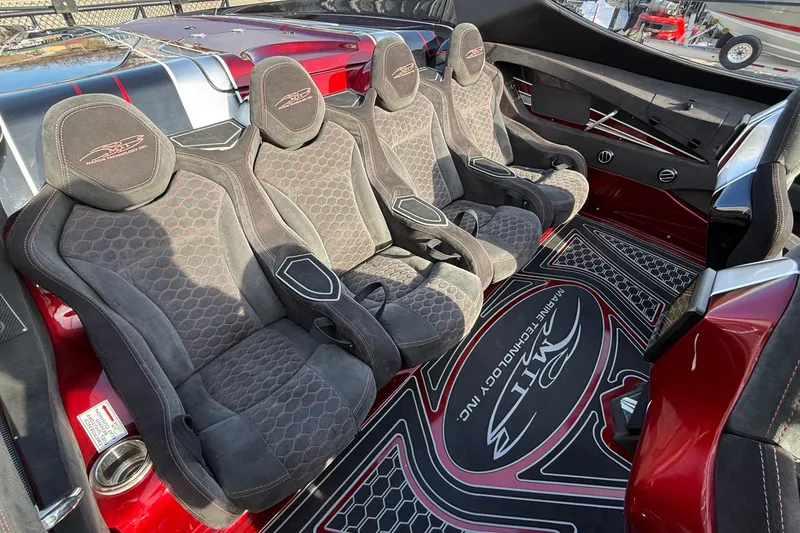 Slide: The Image of Luxurious interior of 2018 MTI 43 R/P boat with custom seating and stylish design. - 22