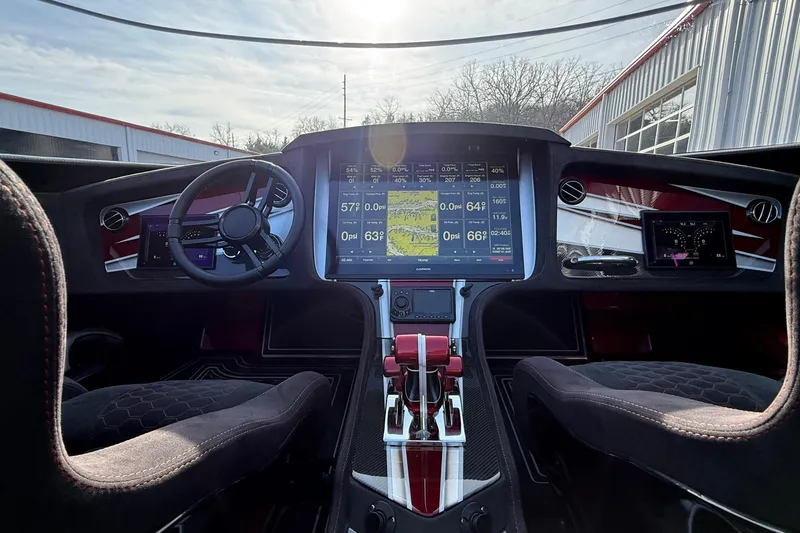 Slide: The Image of 2018 MTI 43 R/P cockpit with advanced digital displays and sleek steering wheel design. - 23