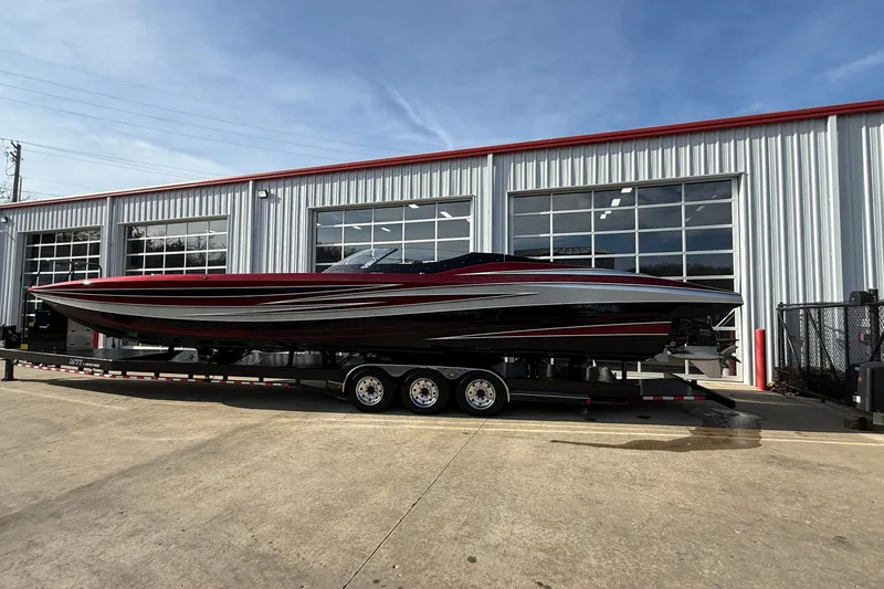 Slide: The Image of 2018 MTI 43 R/P powerboat on trailer outside industrial building. - 4