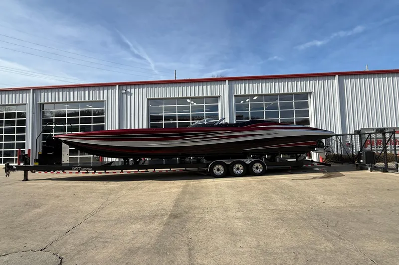 Slide: The Image of 2018 MTI 43 R/P boat on trailer outside industrial building. - 5