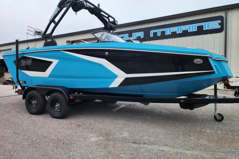 The Image of 2026 Heyday WT-2DC boat in blue and black on a trailer at Aqua Marine. - 1