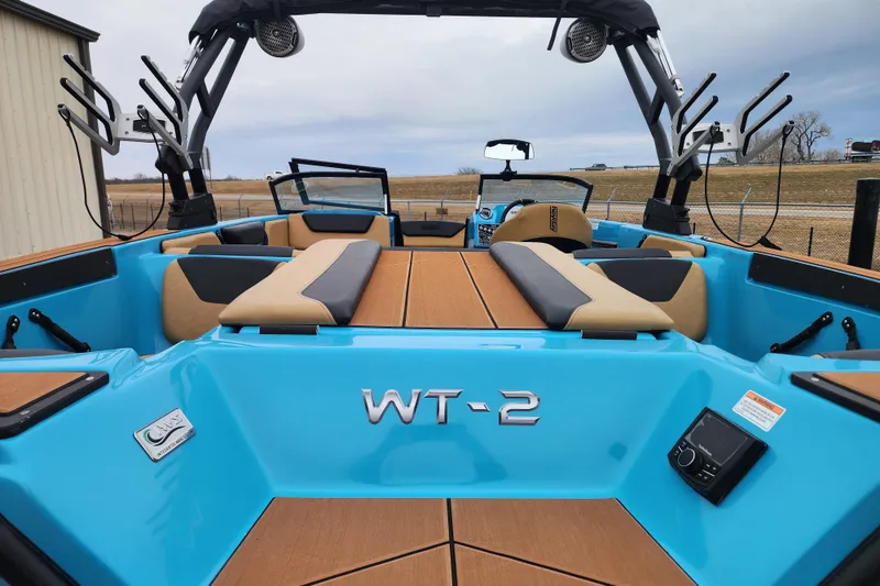 Slide: The Image of 2026 Heyday WT-2DC boat interior with blue and tan seating, showcasing modern design. - 5